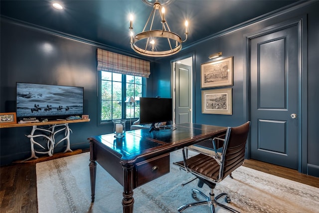 office featuring an inviting chandelier, baseboards, ornamental molding, and wood finished floors