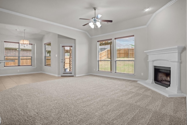 2217 Caroline Dr, Weatherford, TX 76087 - unfurnished living room with crown molding, baseboards, light colored carpet, a fireplace with raised hearth, and ceiling fan with notable chandelier