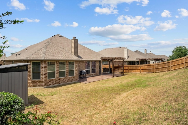 2217 Caroline Dr, Weatherford, TX 76087 - back of property featuring fence, roof with shingles, a pergola, brick siding, and a patio