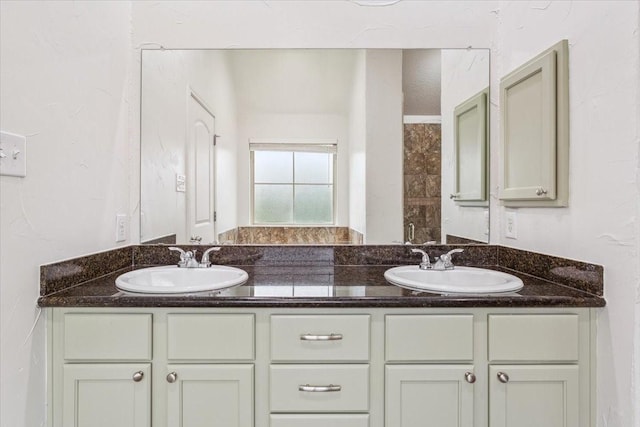 bathroom with double vanity and a sink