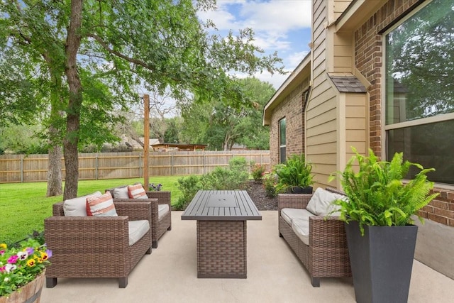 view of patio / terrace with an outdoor hangout area and a fenced backyard