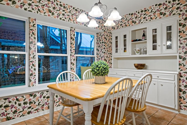 1308 Chesterton Dr, Richardson, TX 75080 - dining space with light tile patterned floors, a chandelier, and wallpapered walls