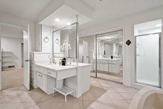 full bathroom featuring vanity, visible vents, recessed lighting, tile patterned floors, and a shower stall