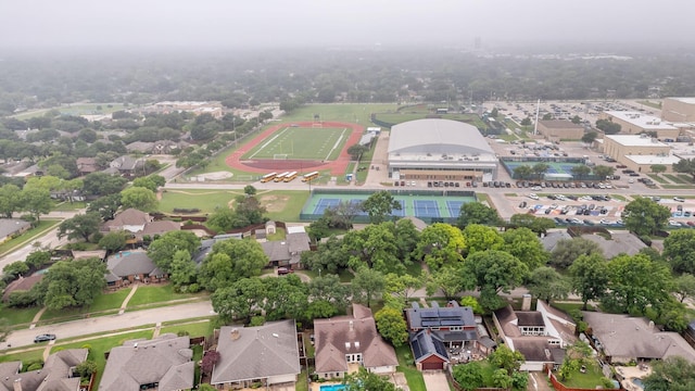 birds eye view of property with a residential view