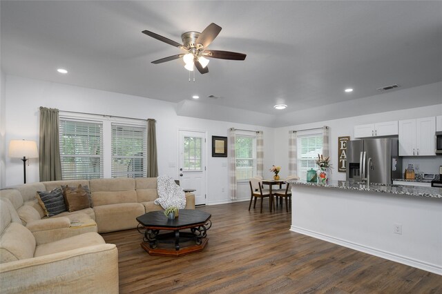 living area with ceiling fan, dark wood-type flooring, recessed lighting, and visible vents
