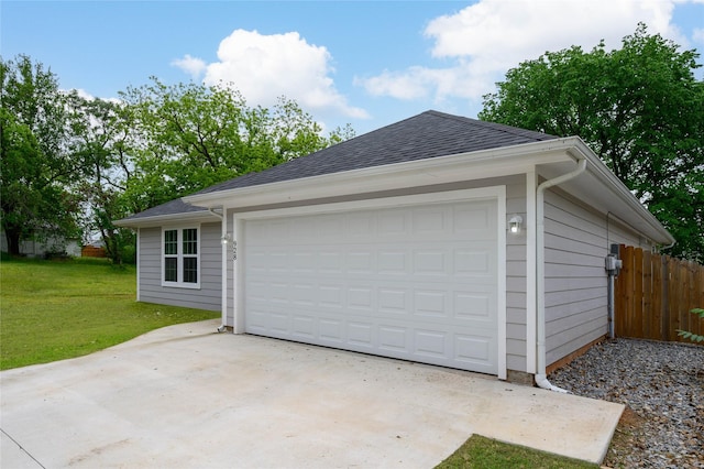 garage featuring fence
