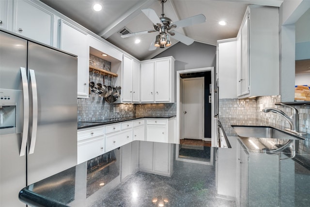 kitchen with visible vents, a ceiling fan, stainless steel fridge with ice dispenser, a sink, and backsplash