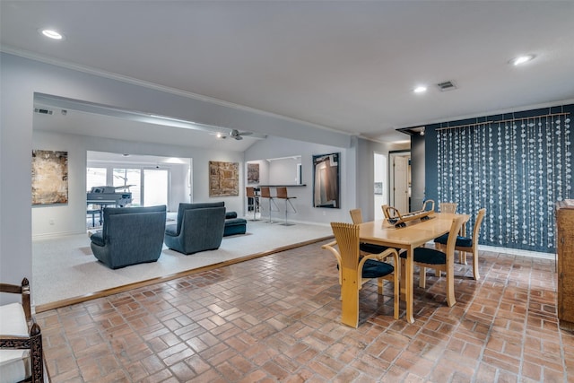 dining room featuring baseboards, brick floor, recessed lighting, and visible vents