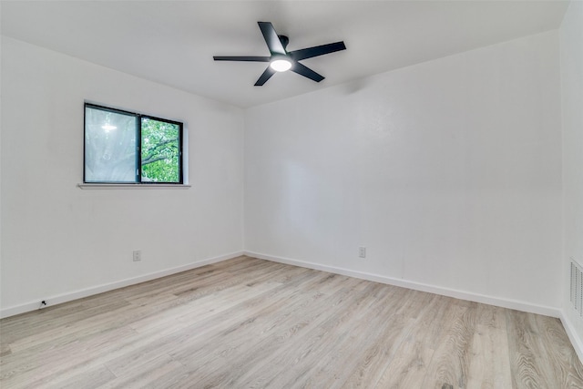 6401 Gate Ridge Cir, Garland, TX 75043 - empty room featuring baseboards, a ceiling fan, and wood finished floors