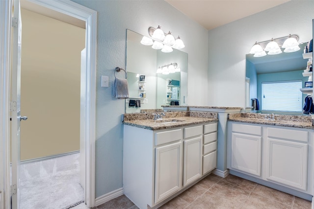 9204 Lockhart Dr, Arlington, TX 76002 - bathroom featuring two vanities and tile patterned flooring