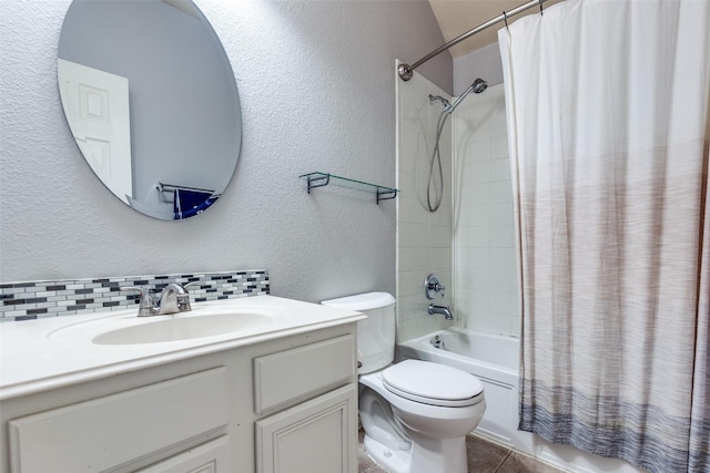 9204 Lockhart Dr, Arlington, TX 76002 - bathroom featuring a textured wall, shower / tub combo, tasteful backsplash, toilet, and vanity