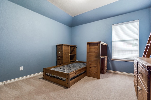9204 Lockhart Dr, Arlington, TX 76002 - bedroom with carpet floors, lofted ceiling, and baseboards