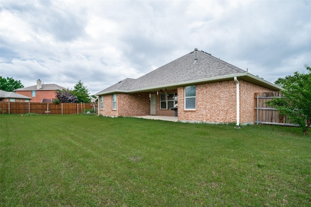 9204 Lockhart Dr, Arlington, TX 76002 - back of house with brick siding, a shingled roof, and a patio area