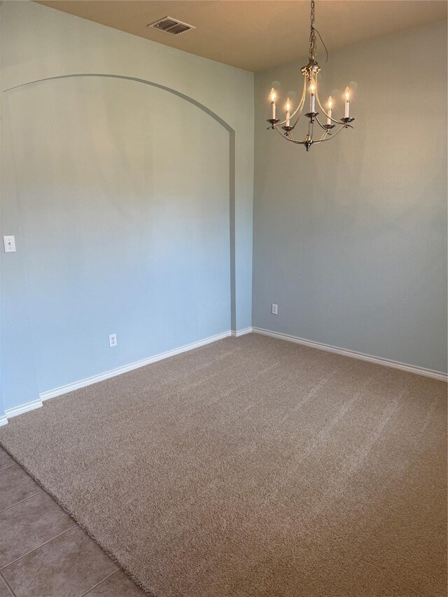 9204 Lockhart Dr, Arlington, TX 76002 - carpeted spare room featuring a chandelier and baseboards