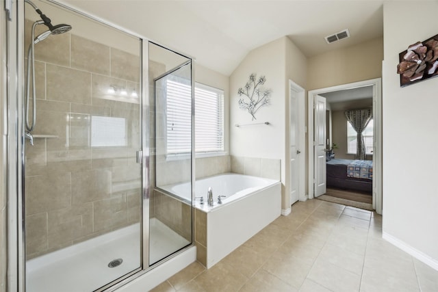 bathroom with tile patterned floors, a shower stall, and visible vents