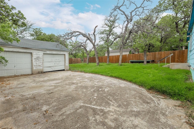 garage featuring fence