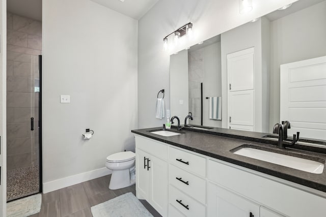 811 County Road 3451, Paradise, TX 76073 - bathroom featuring baseboards, a shower stall, and a sink
