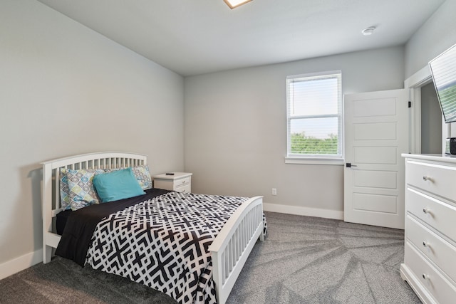 811 County Road 3451, Paradise, TX 76073 - bedroom featuring carpet floors, baseboards, and multiple windows