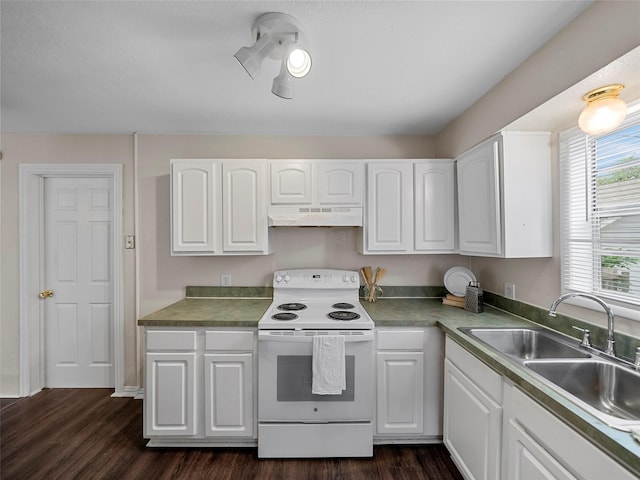 1227 W Walker St, Denison, TX 75020 - kitchen with dark wood-style flooring, a sink, white cabinetry, under cabinet range hood, and white electric range