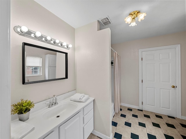 1227 W Walker St, Denison, TX 75020 - full bathroom with vanity, tile patterned floors, shower / bathtub combination with curtain, baseboards, and visible vents