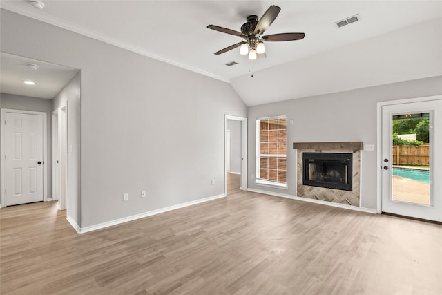 unfurnished living room featuring baseboards, a ceiling fan, light wood-type flooring, and visible vents