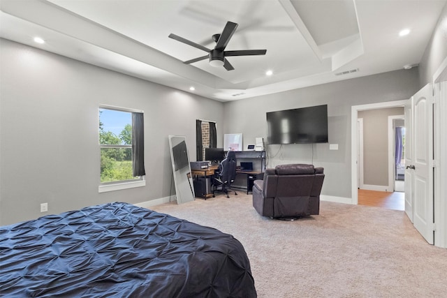 408 Bethlehem St, Terrell, TX 75160 - bedroom with carpet, an office area, recessed lighting, a raised ceiling, and a ceiling fan