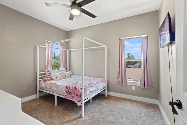 408 Bethlehem St, Terrell, TX 75160 - bedroom with carpet, baseboards, and a ceiling fan