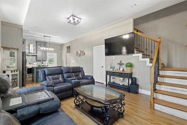 408 Bethlehem St, Terrell, TX 75160 - living room featuring light wood-style floors and stairs