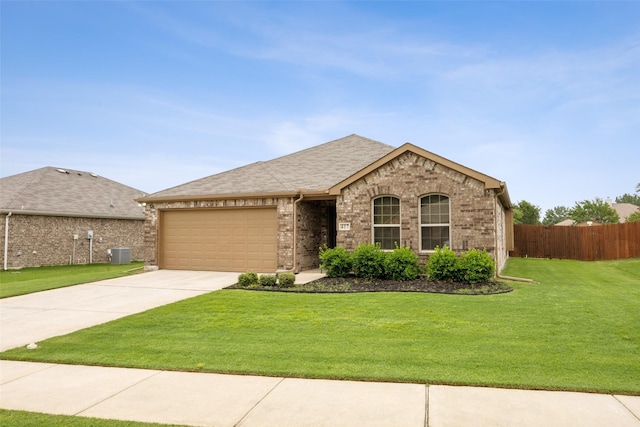 417 Highmeadow Dr, Aubrey, TX 76227 - single story home with fence, a front yard, brick siding, an attached garage, and driveway