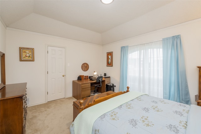 bedroom featuring light colored carpet and vaulted ceiling
