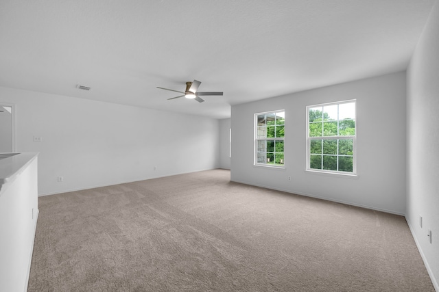 13029 Guerin Dr, Frisco, TX 75035 - carpeted empty room featuring a ceiling fan, baseboards, and visible vents