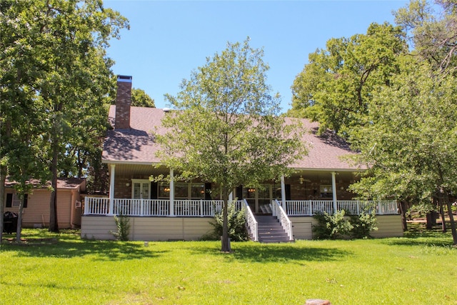 6928 Scott St, Eustace, TX 75124 - view of front of house featuring covered porch, a front yard, a chimney, and roof with shingles