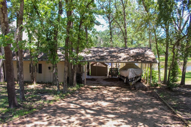6928 Scott St, Eustace, TX 75124 - view of front of property with driveway and a detached carport