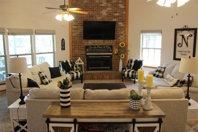 6928 Scott St, Eustace, TX 75124 - living area with ceiling fan and a brick fireplace