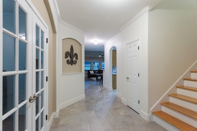 1309 Foxglove Ln, Burleson, TX 76028 - hallway featuring ornamental molding, arched walkways, baseboards, french doors, and stairs
