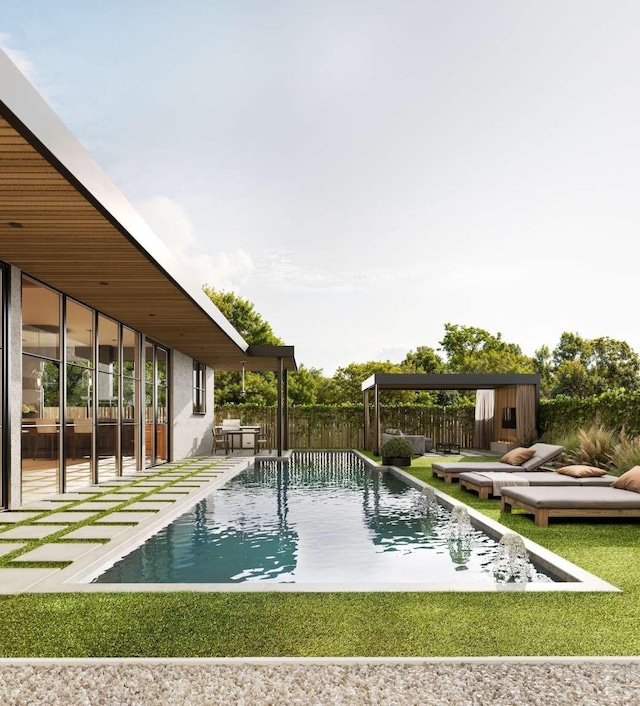 view of swimming pool featuring a fenced in pool, a fenced backyard, and an outbuilding
