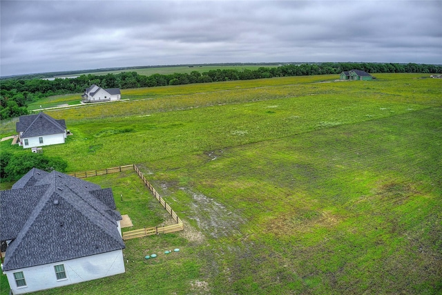 birds eye view of property featuring a rural view