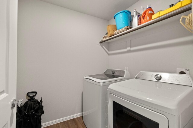 1421 Avalon Ct, Celina, TX 75009 - washroom featuring washing machine and clothes dryer, wood finished floors, and baseboards
