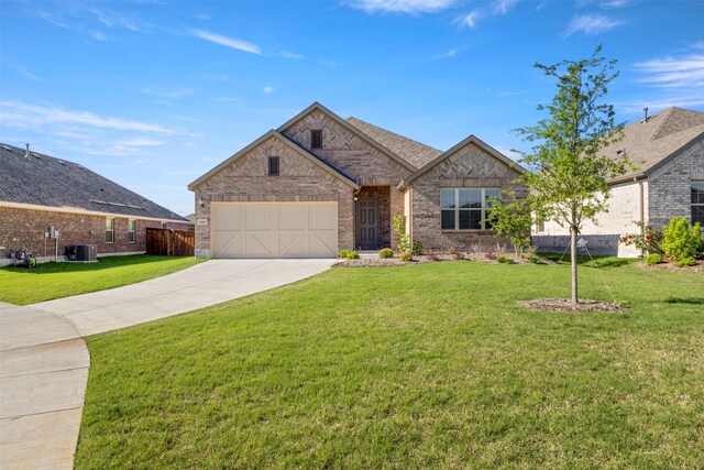 1421 Avalon Ct, Celina, TX 75009 - view of front of property featuring driveway, brick siding, an attached garage, and central AC unit