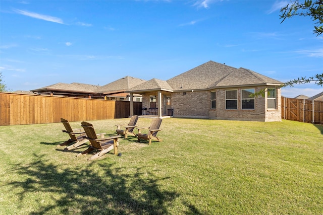 1421 Avalon Ct, Celina, TX 75009 - back of house with brick siding and a shingled roof