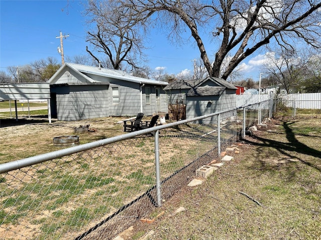 view of home's exterior with fence