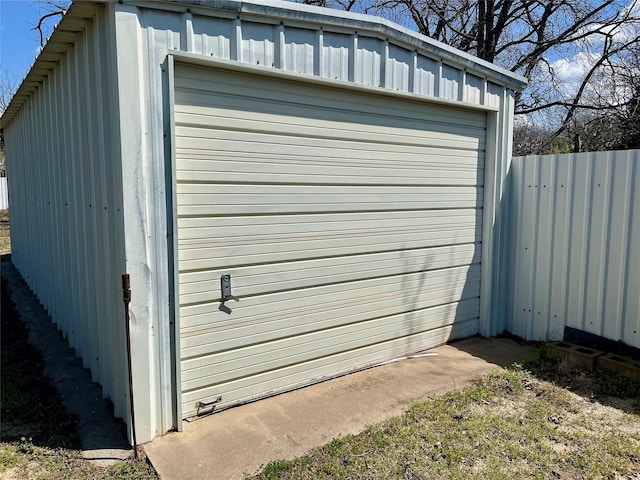 garage with fence