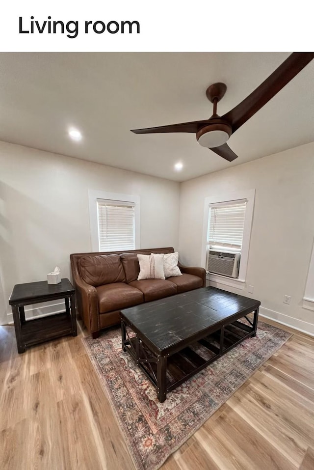 living room featuring ceiling fan, cooling unit, recessed lighting, and wood finished floors