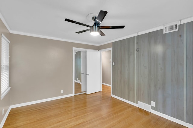 9528 Ash Creek Dr, Dallas, TX 75228 - unfurnished room with crown molding, a ceiling fan, and visible vents
