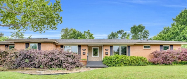9528 Ash Creek Dr, Dallas, TX 75228 - ranch-style house featuring brick siding and a front lawn
