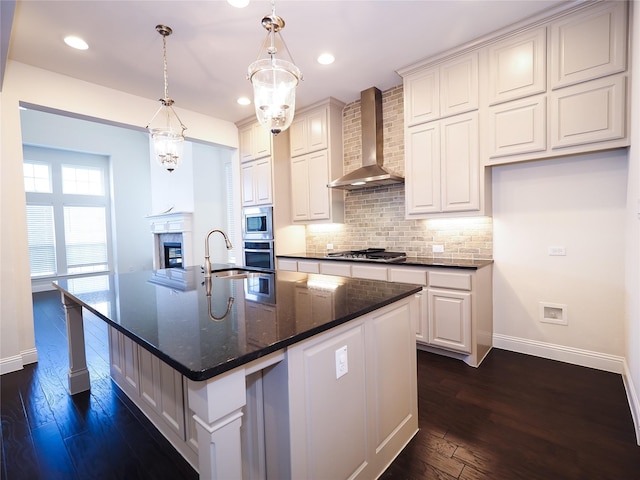 6900 Royal Liverpool Dr, Mckinney, TX 75070 - kitchen with baseboards, wall chimney range hood, dark wood-type flooring, backsplash, and stainless steel appliances