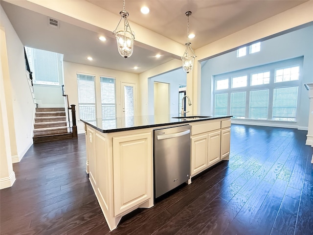 6900 Royal Liverpool Dr, Mckinney, TX 75070 - kitchen featuring dark wood-style flooring, visible vents, dark countertops, dishwasher, and a sink