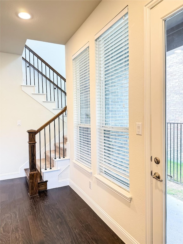 6900 Royal Liverpool Dr, Mckinney, TX 75070 - interior space featuring stairs, baseboards, and dark wood-type flooring