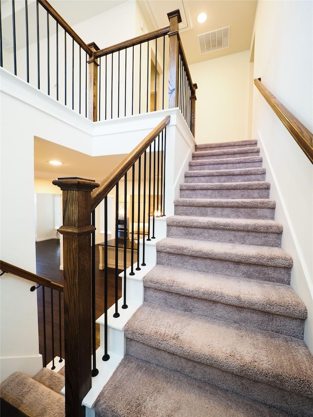 6900 Royal Liverpool Dr, Mckinney, TX 75070 - staircase featuring recessed lighting and visible vents