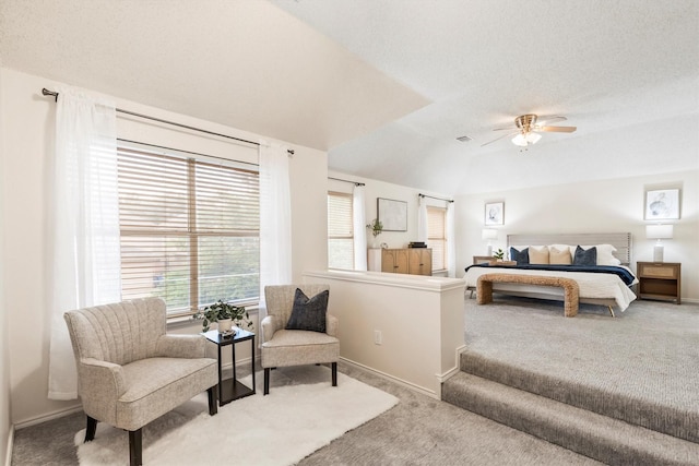carpeted bedroom with baseboards and ceiling fan